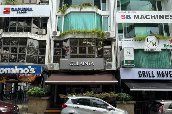 Spot GulaiNya from the street, wher<em></em>e it's located between Domino's Pizza and Grill Haven — Picture by Lee Khang Yi